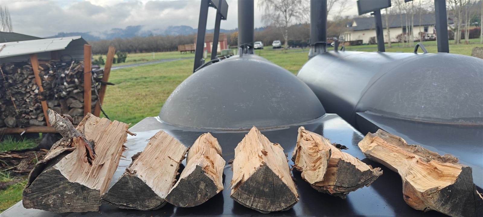 Briar Ridge BBQ trailer smokers at night with fresh briskets resting